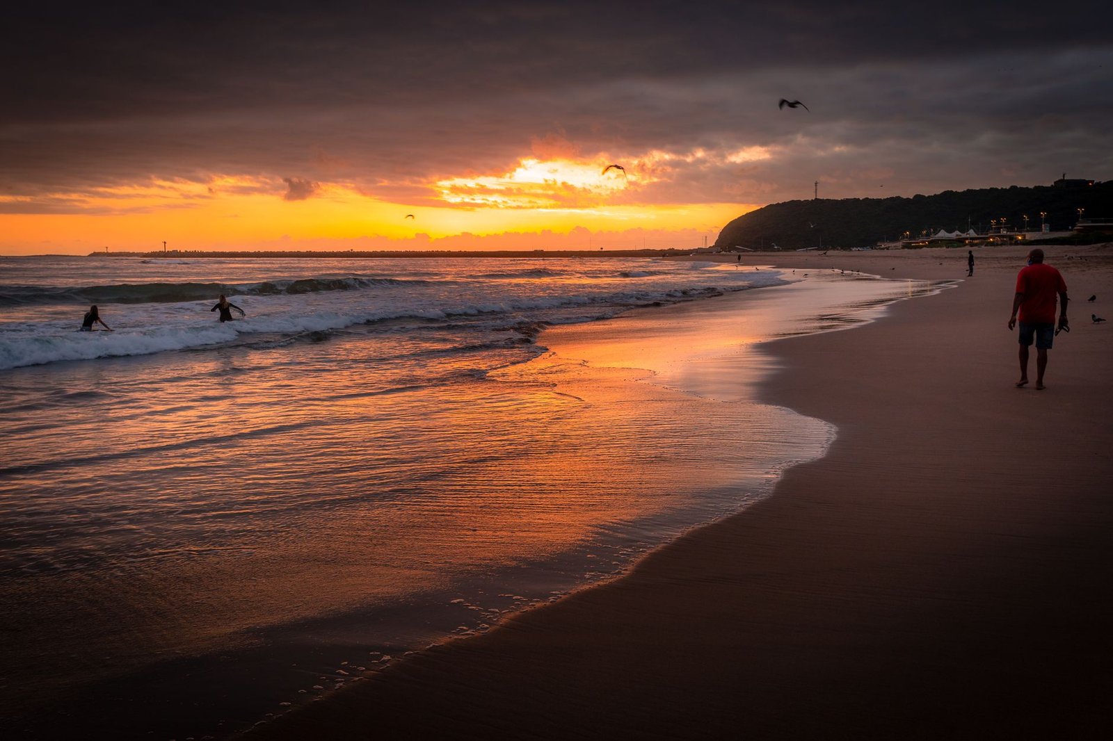 Durban city skyline at dusk with warm evening light over the ocean