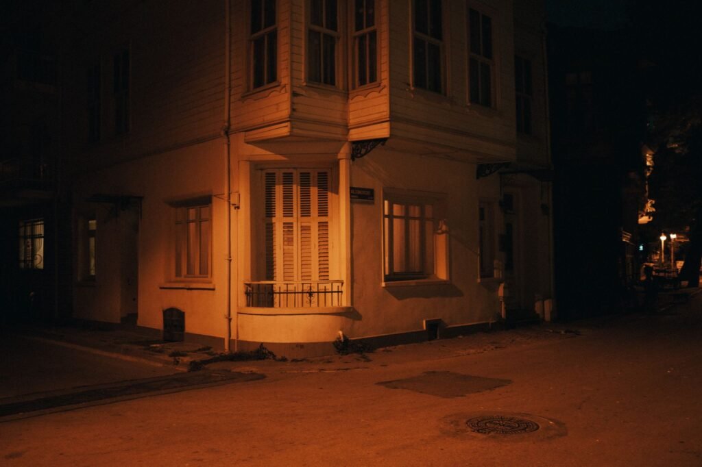 Quiet, well-lit street in a Pretoria nightlife district after dark