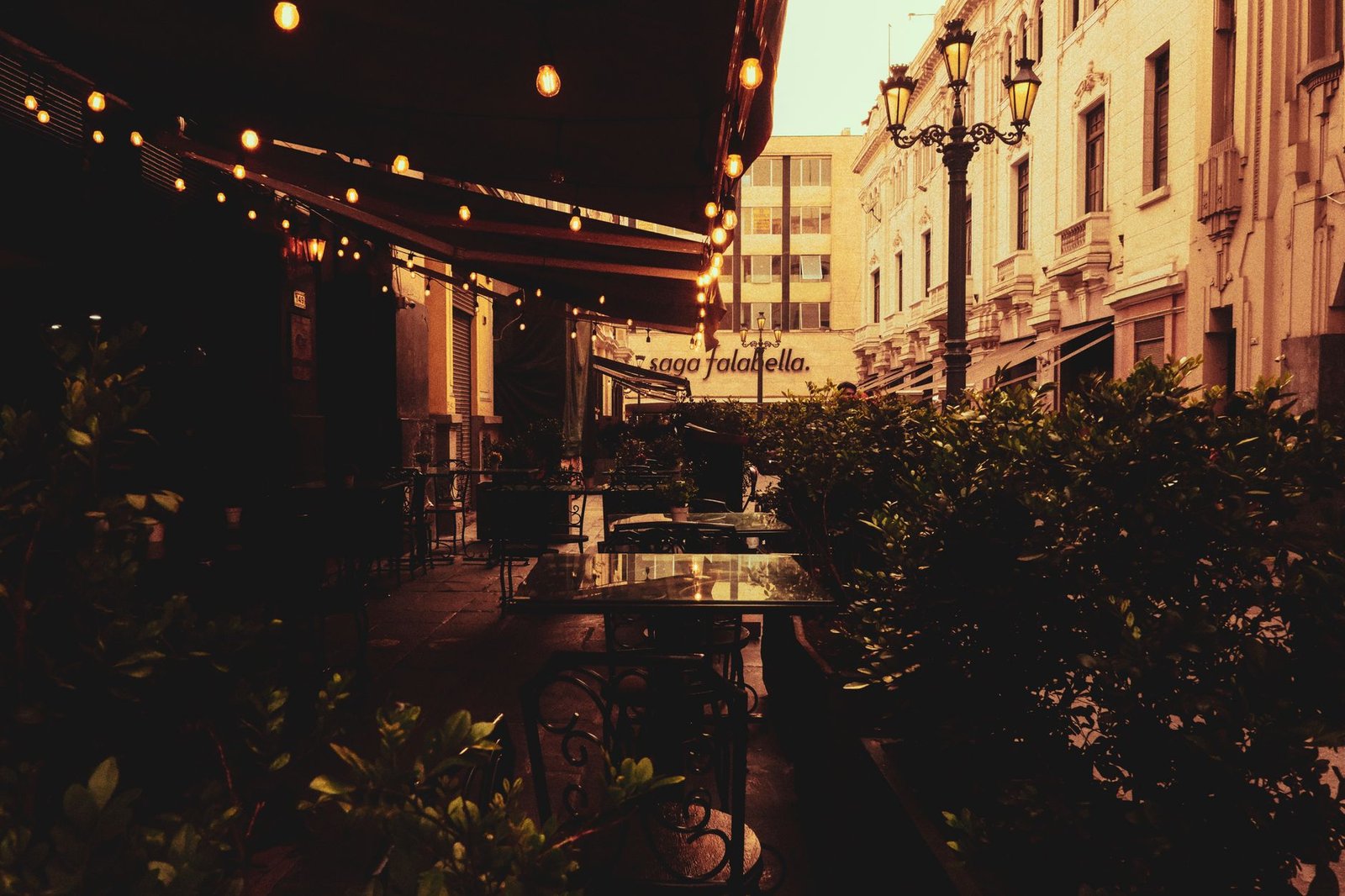 Warm-lit outdoor terrace in a Pretoria district at dusk