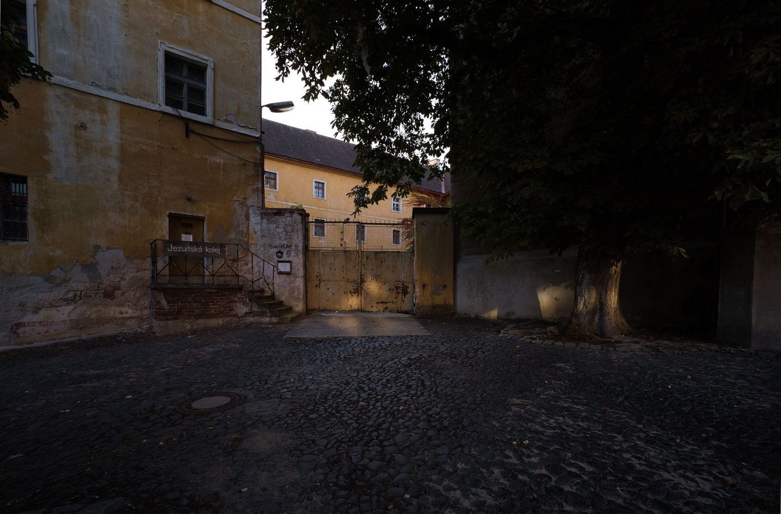 A quiet street in Sasolburg at dusk with warm streetlights