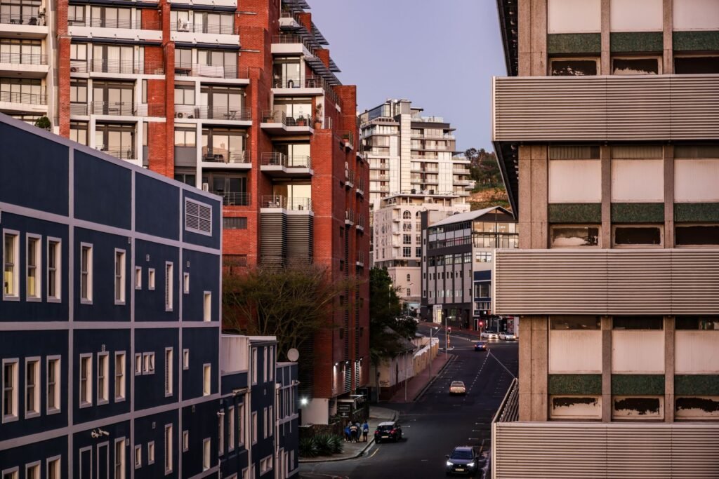 A quiet, well-lit street in Green Point, Cape Town at dusk